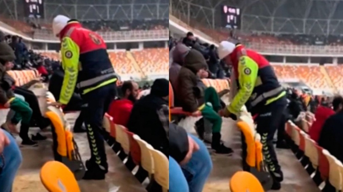 <p>Stadionda polis məmuru donmuş uşağa corab verib</p>